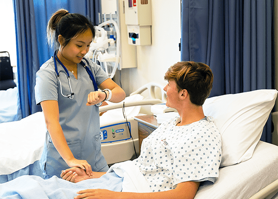 Clinical medical assistant helping patient